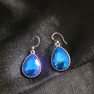 Capri blue teardrop earrings with silver-plated fishhook ear wires.
